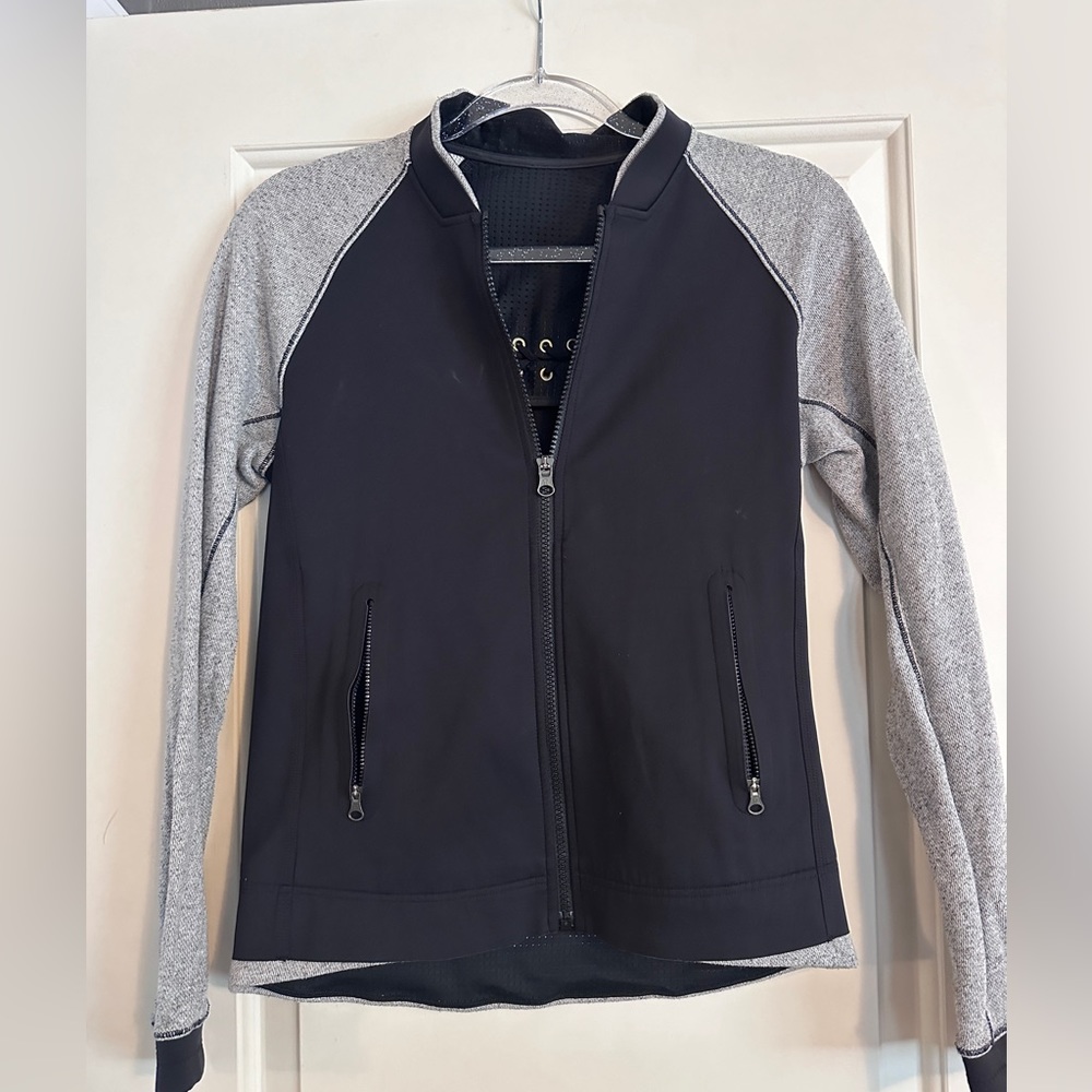 Lululemon baseball style jacket. Excellent condition. Well cared for. Size 6.